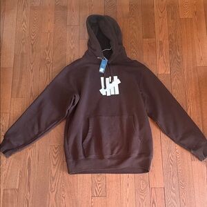 Undefeated Brown Pullover Hoodie with White Logo